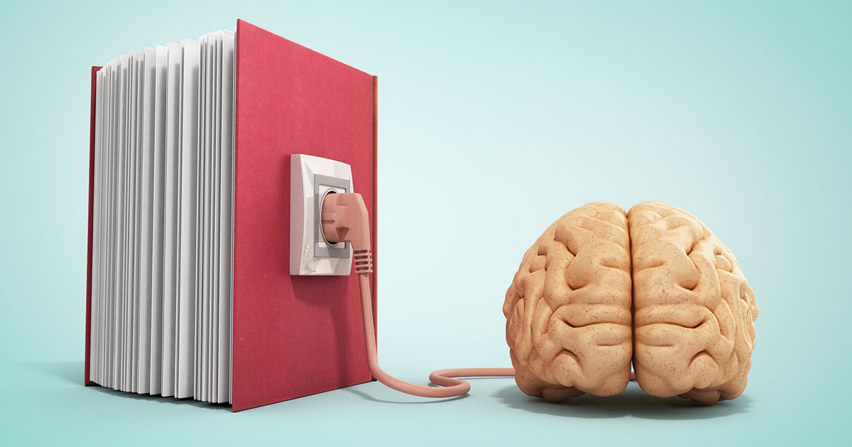 brain plugged into a book