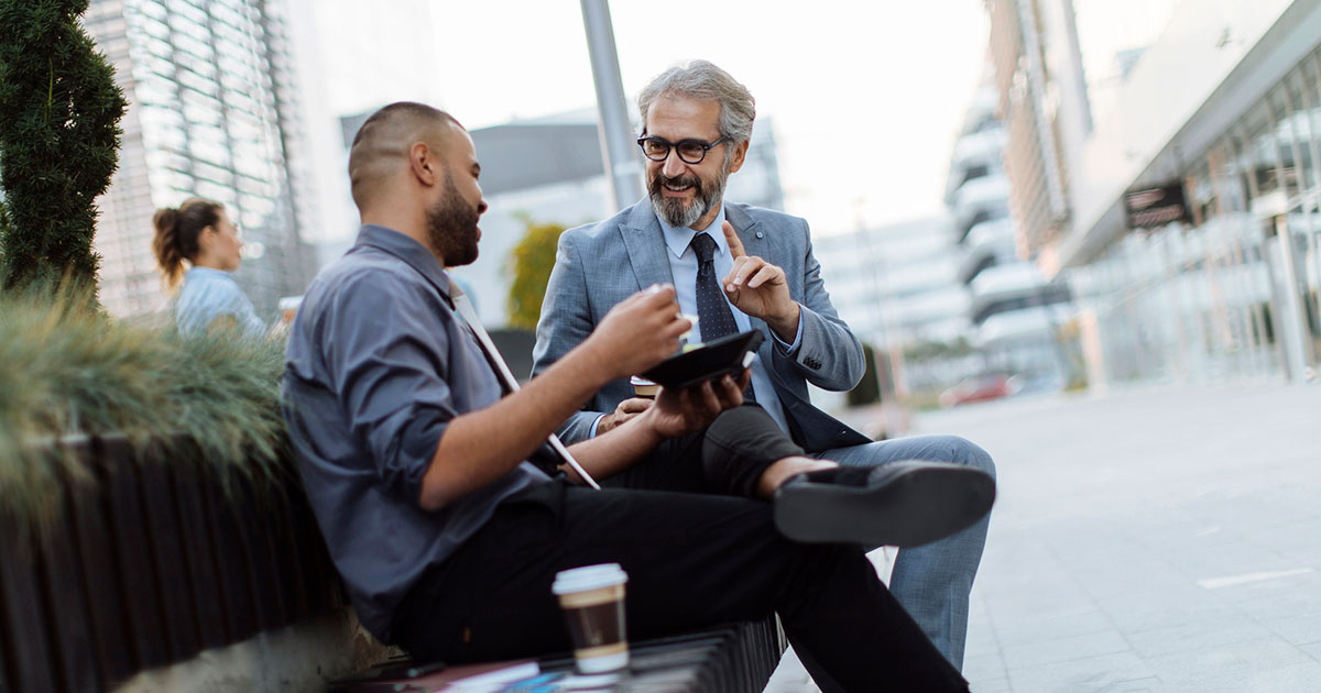 Mentor and mentee meet over coffee