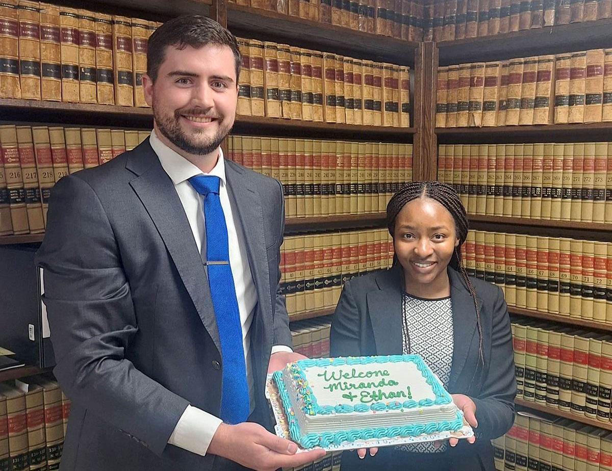 Ethan Saberhagen, left, participated as a 2024 summer clerk in the State Bar’s Rural Clerkship Program, with Slaby Deda Law Offices in Phillips. He is pictured here with Miranda Tichareva, a new associate with the firm. 