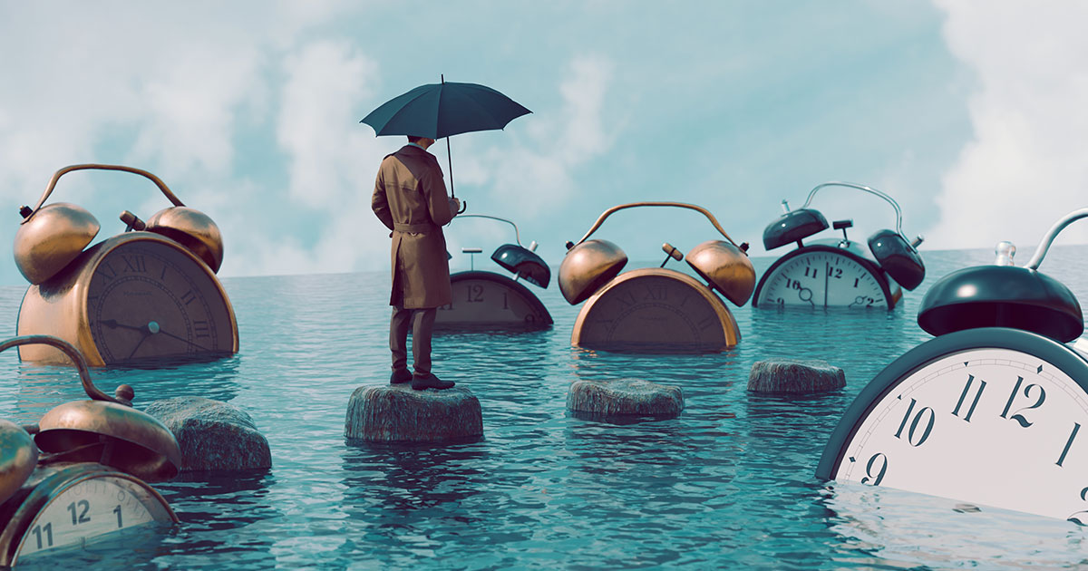 person with an umbrella on a stepping stone in an ocean with clocks floating in the water